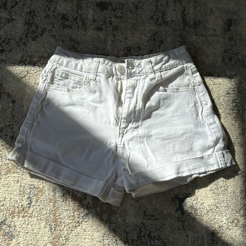 White denim shorts.